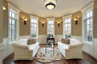 Living room in luxury home with lighting scones